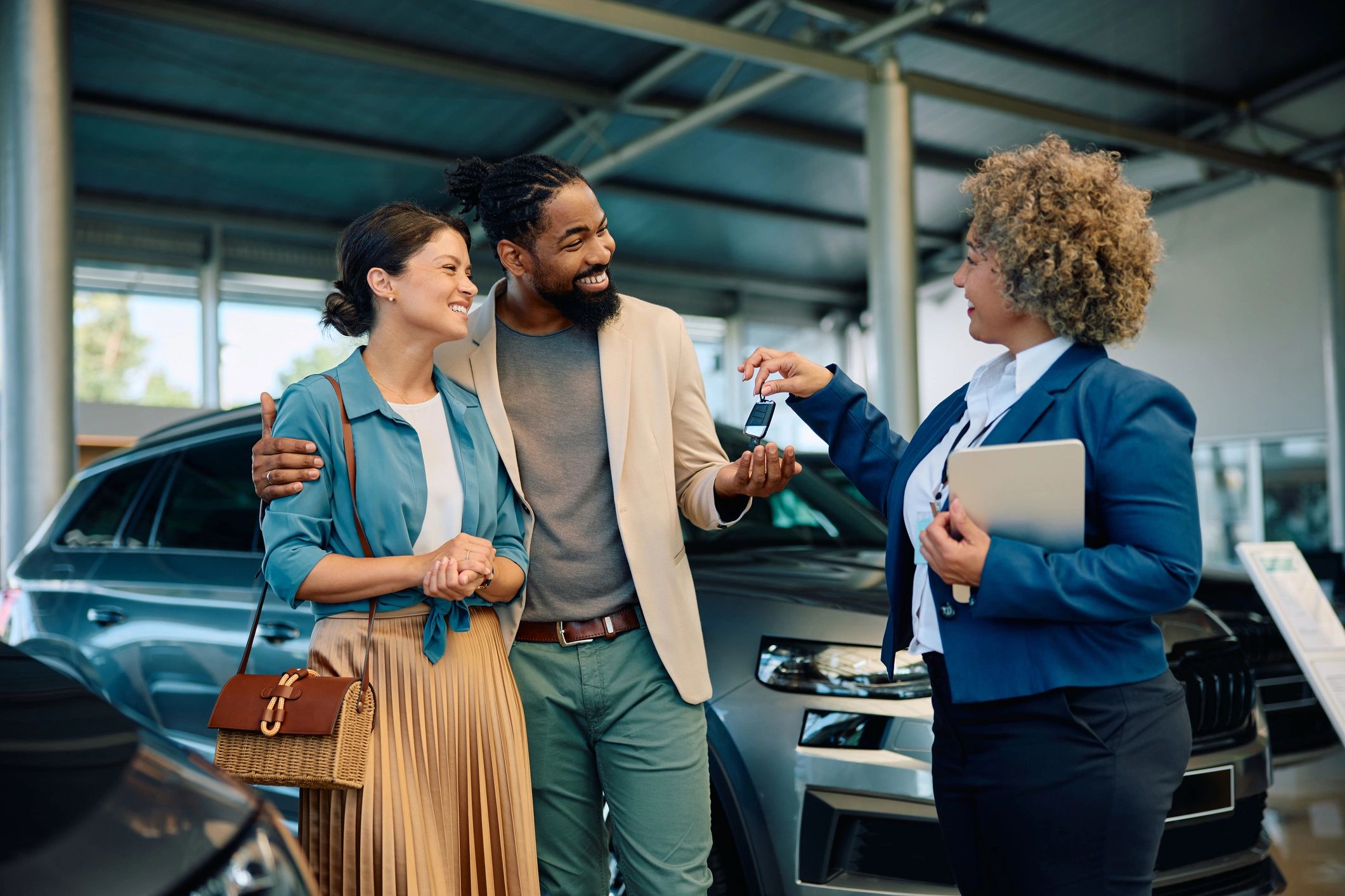 Happy family with their rented car